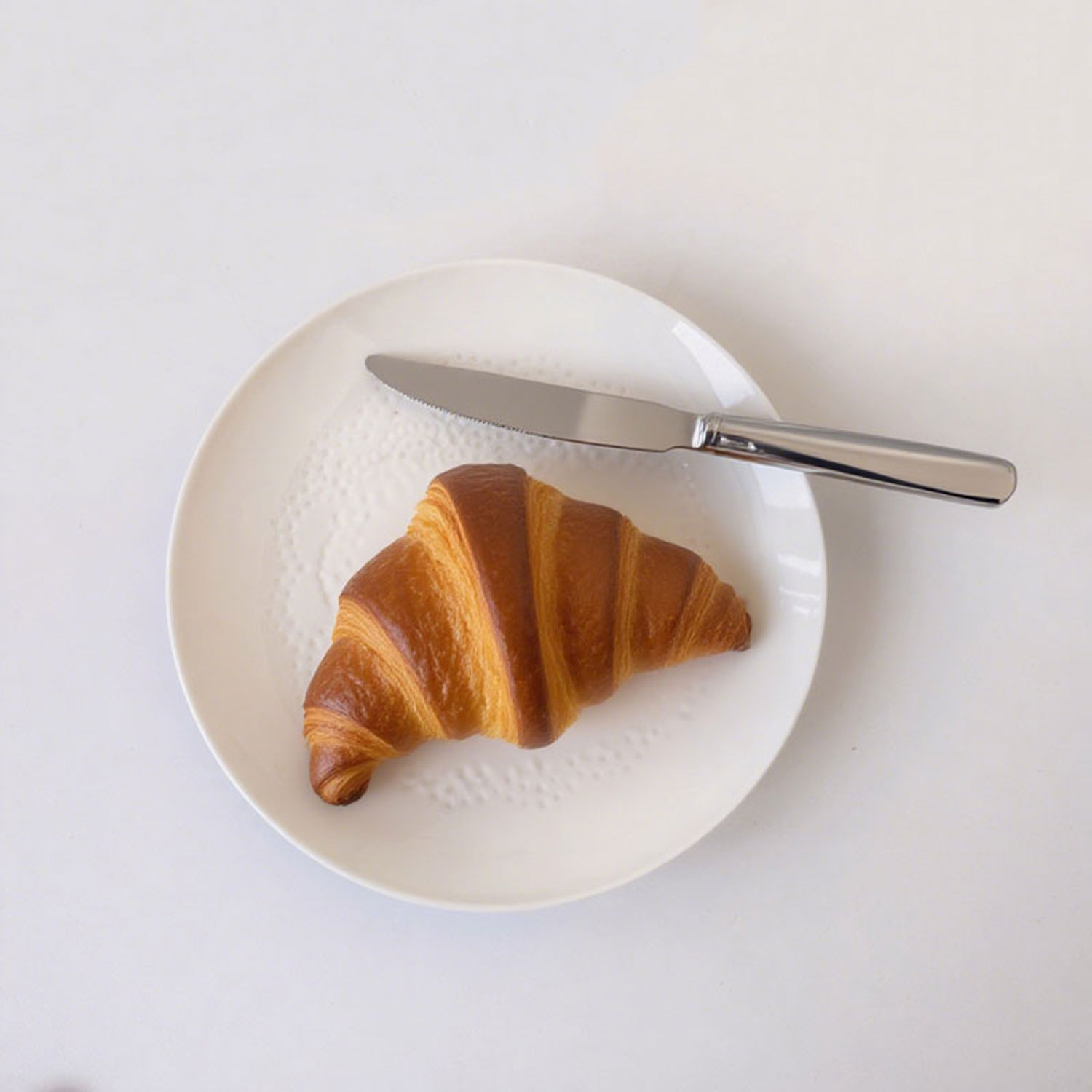 Embossed Floral White Ceramic Plate