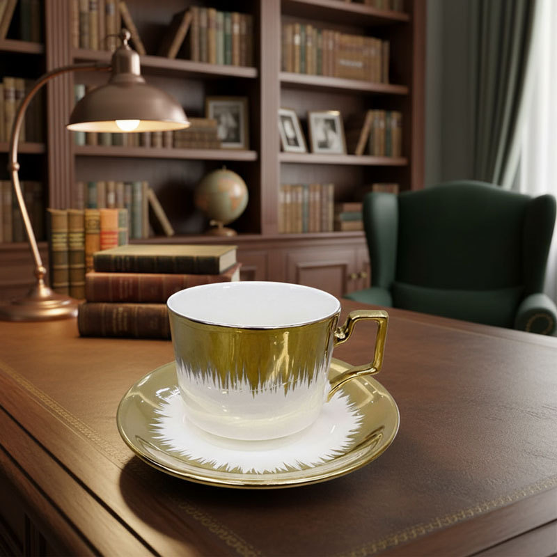 Gold - White Ceramic Cup and Saucer Set