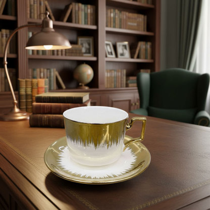 Gold - White Ceramic Cup and Saucer Set