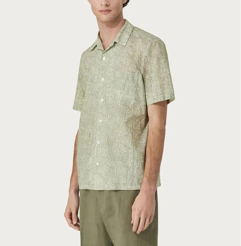 Camicia di lino con motivo di piante verde e bianco, modello ampio