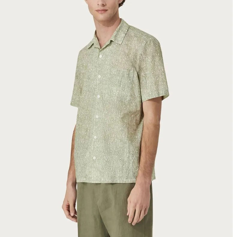 Camicia di lino con motivo di piante verde e bianco, modello ampio
