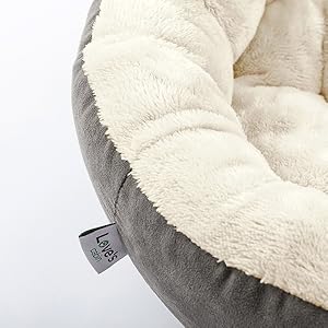 Raised sides provide support for pets' head, neck.