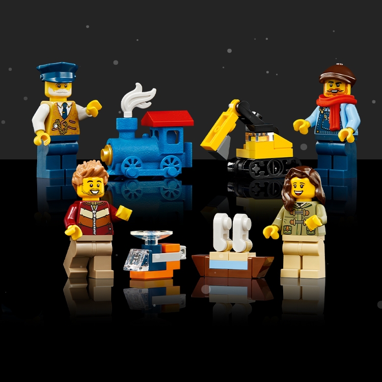 Minifigure allineate con la neve che cade sullo sfondo.