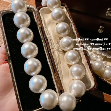 "Mermaid's Tears: Opulent Pearl Necklace"--13mm