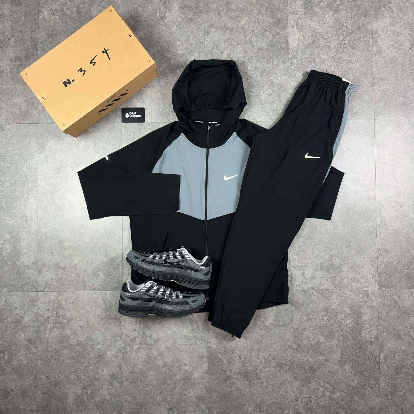 Nike Woven Repel Miler Windrunner Jacket Black / Grey