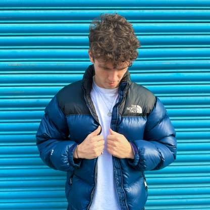 The North Face Navy Blue Puffer Jacket WITH SMALL STAIN