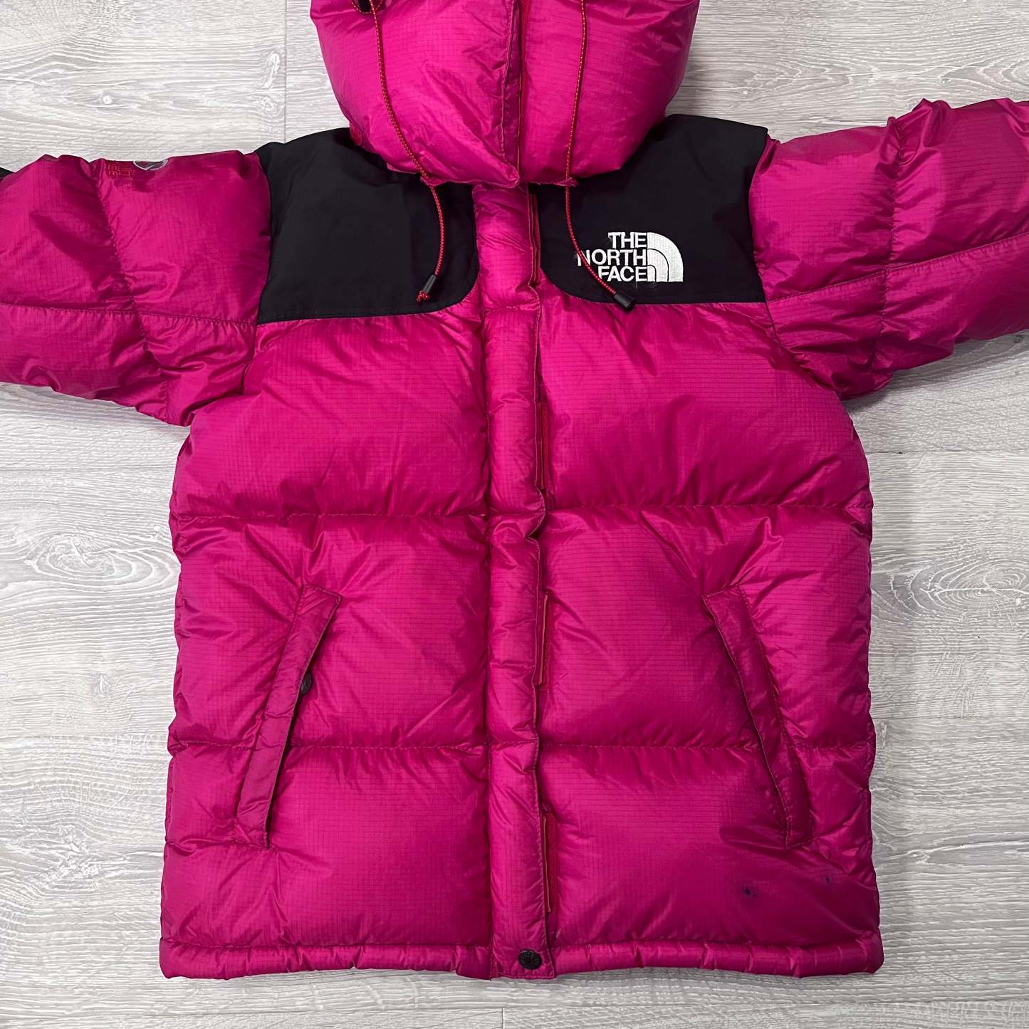 Women’s The North Face Pink Baltoro Puffer Jacket WITH STAIN