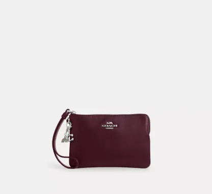 Boxed Corner Zip Wristlet In Signature Canvas With Charms