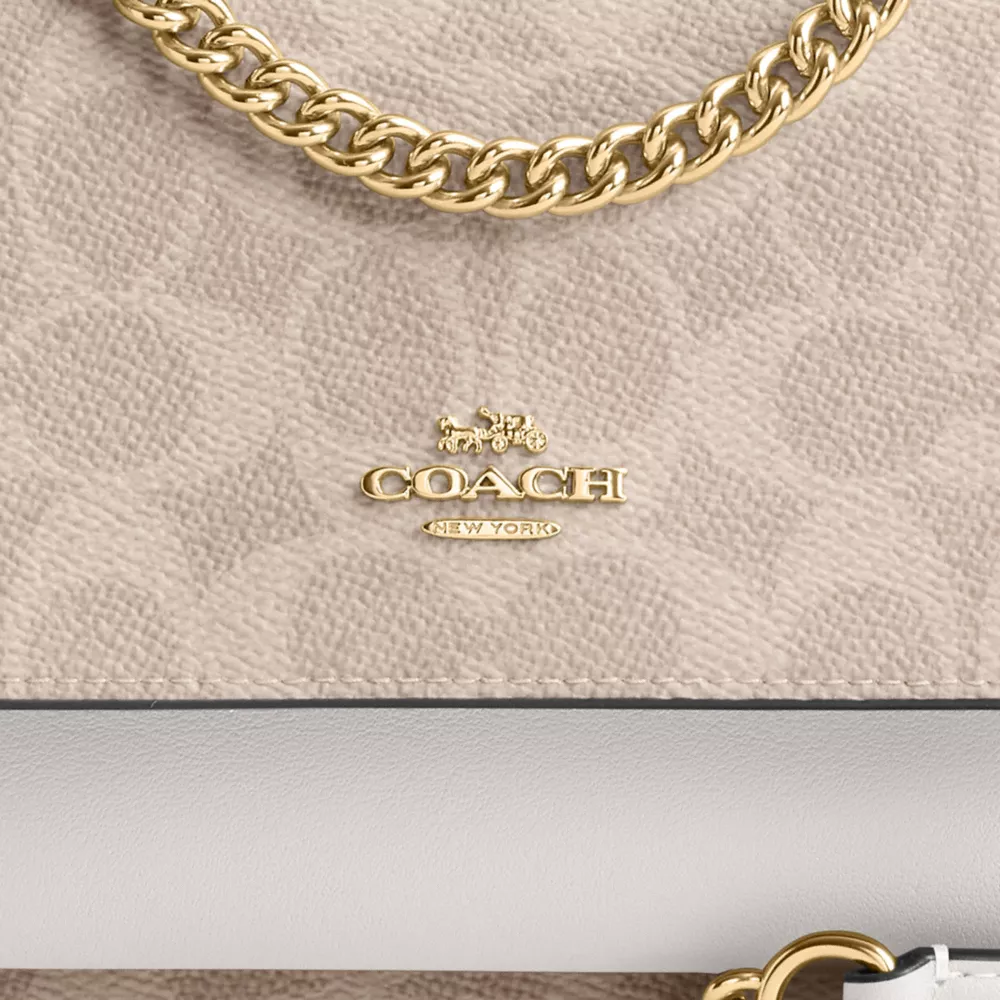 Mini Klare Crossbody Bag In Signature Canvas