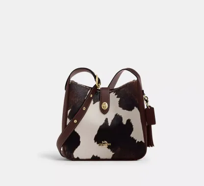Hadley Convertible Crossbody Bag With Cow Print And Tassel