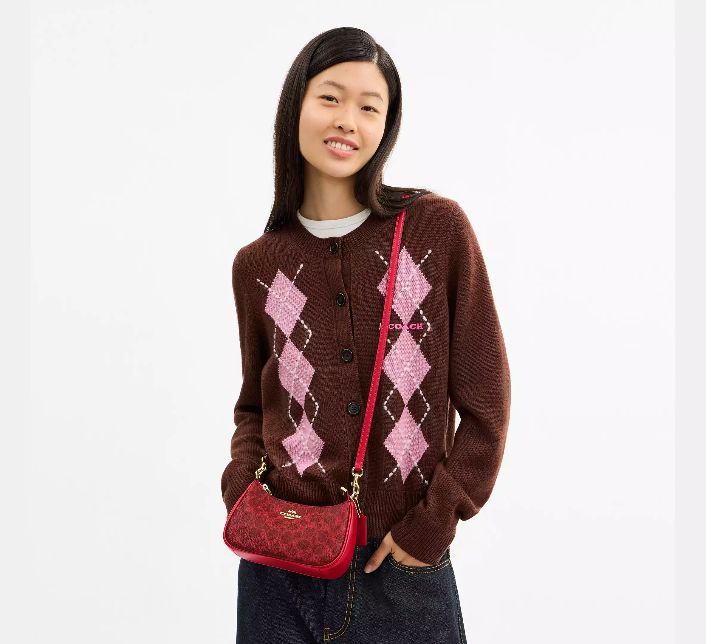 Teri Mini Crossbody Bag In Signature Canvas