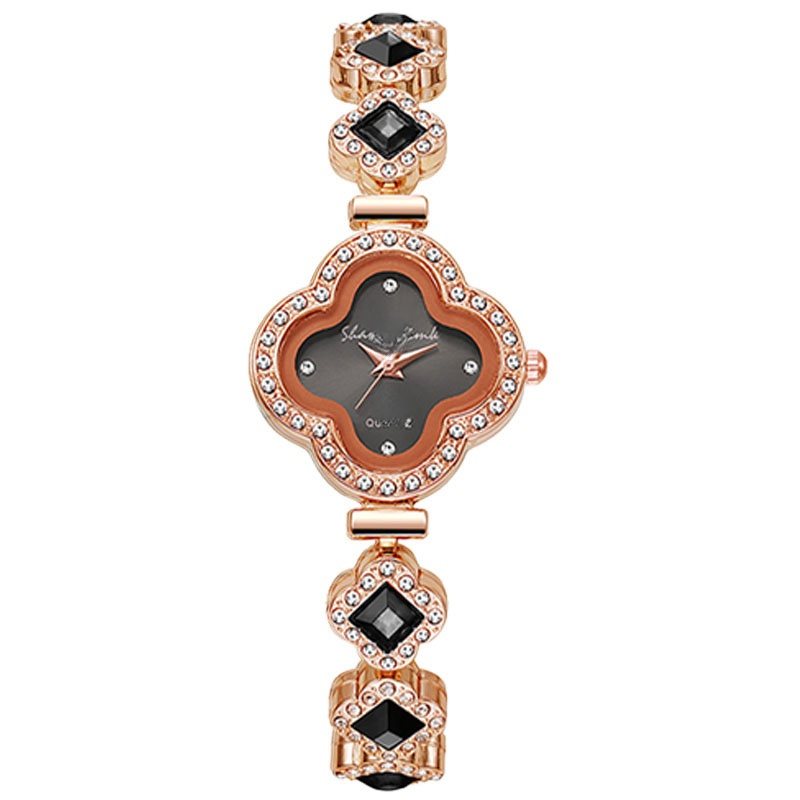 Szmaragdowa bransoletka z koniczyną.