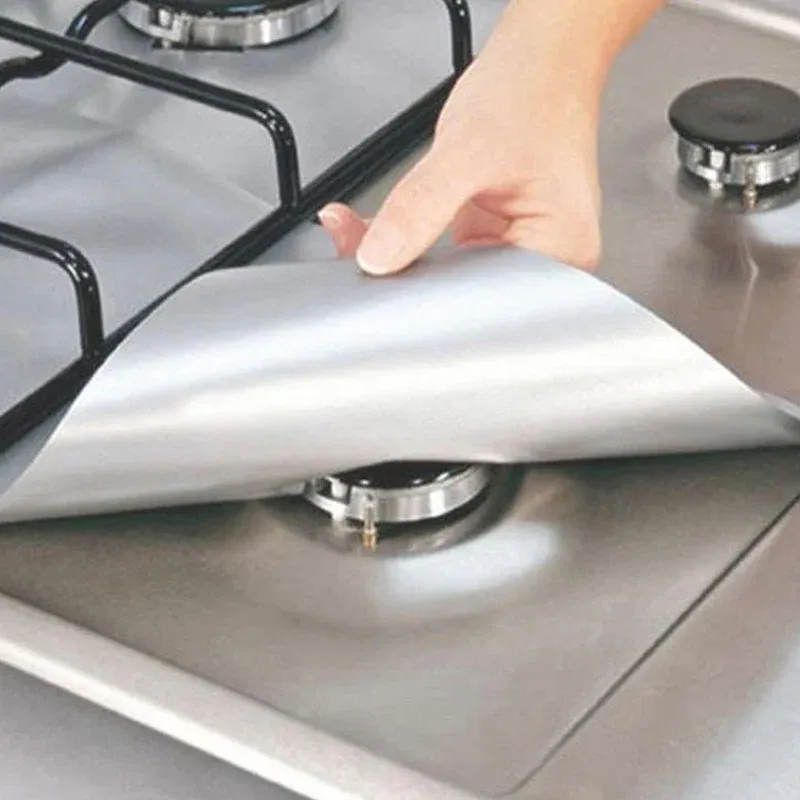 Non-stick stove burner liner surface