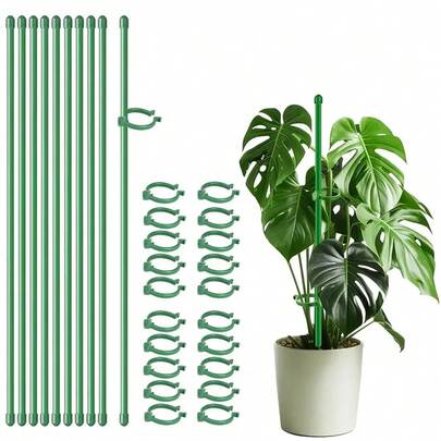 a collection of green plant stakes and clips arranged on a white background