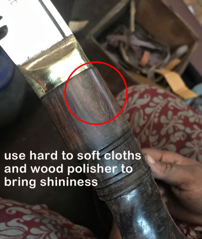 shining handle of the kukri after treating cracks