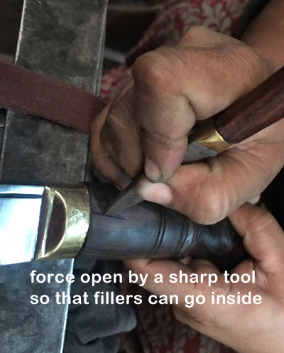 opening kukri cracks for filling gaps