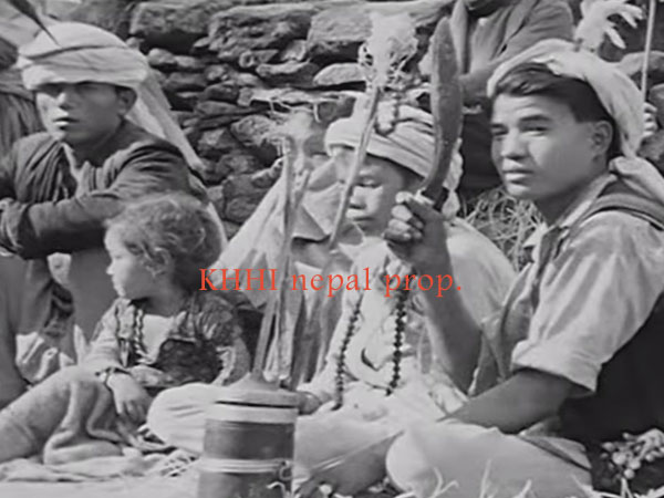 performing religious rituals carrying an old BhojPure kukri in 1950's