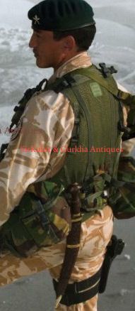 Gurkha soldier standing with his chainpure kukri