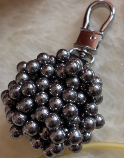 Strong magnetic pendant, slingshot force magnet, steel ball and iron attracting outdoor pendant, slingshot key buckle