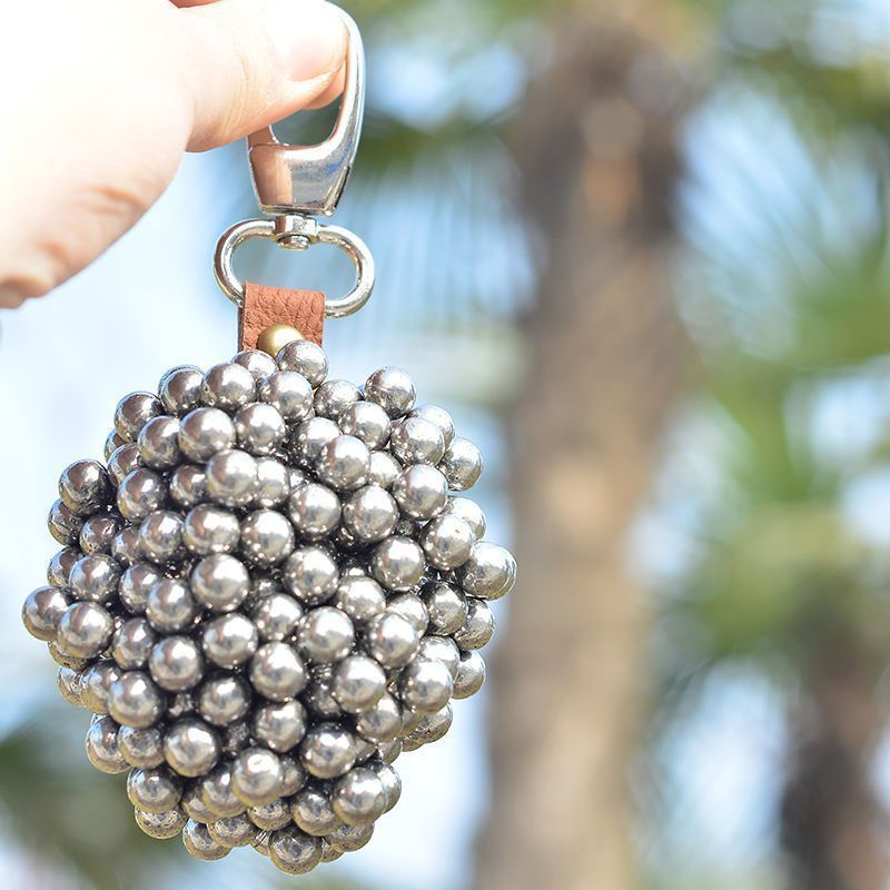 Strong magnetic pendant, slingshot force magnet, steel ball and iron attracting outdoor pendant, slingshot key buckle