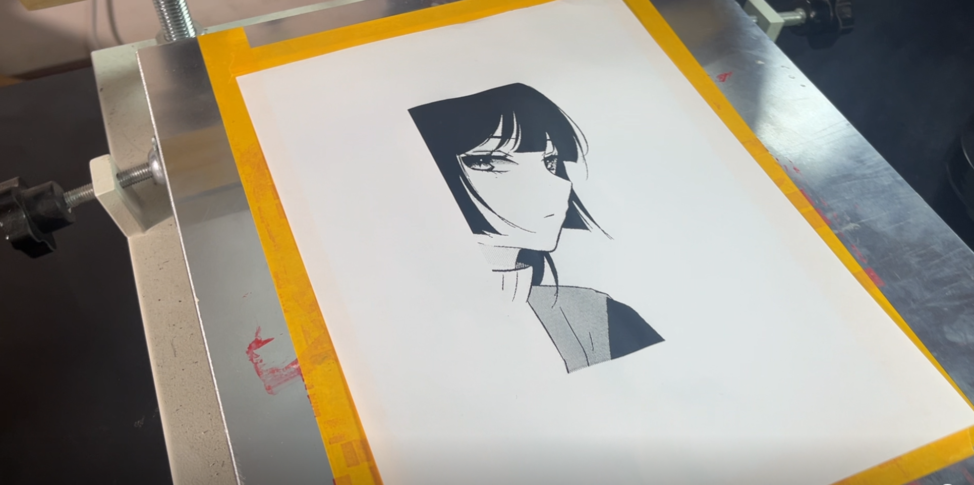 Pulling the squeegee in one steady pass with consistent angle and pressure