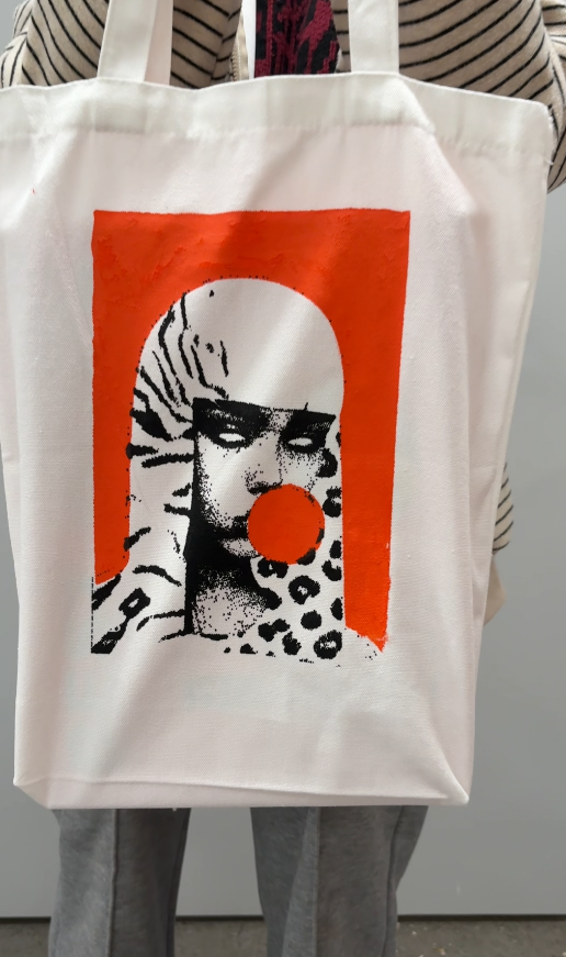 80 mesh screen print on a tote bag with bold ink coverage on textured fabric