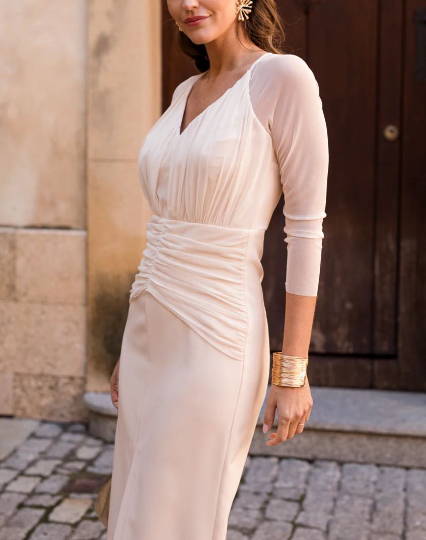 Beige draped midi dress with tulle sleeves.