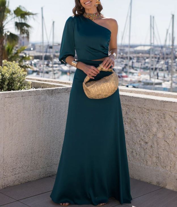 Long dress with asymmetrical neckline and cut-out in green