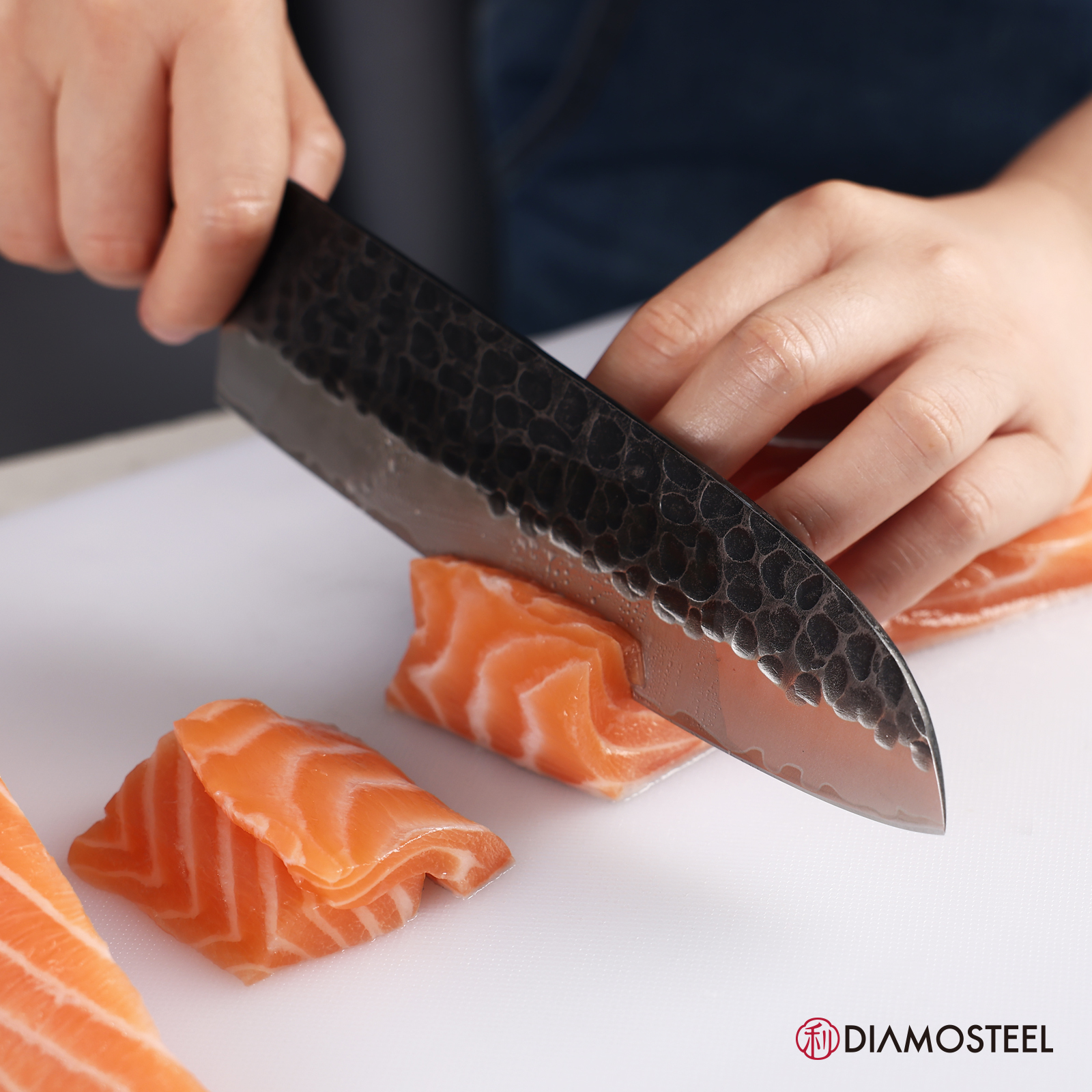 Diamosteel Santoku Knife - 7-Inch Professional Kitchen Knife - Hammered Black Oxide Blade Japanese 9CR18MOV High Carbon Stainless Steel Sharp Chef Knife - Ergonomic Pakkawood Handle with Present Box