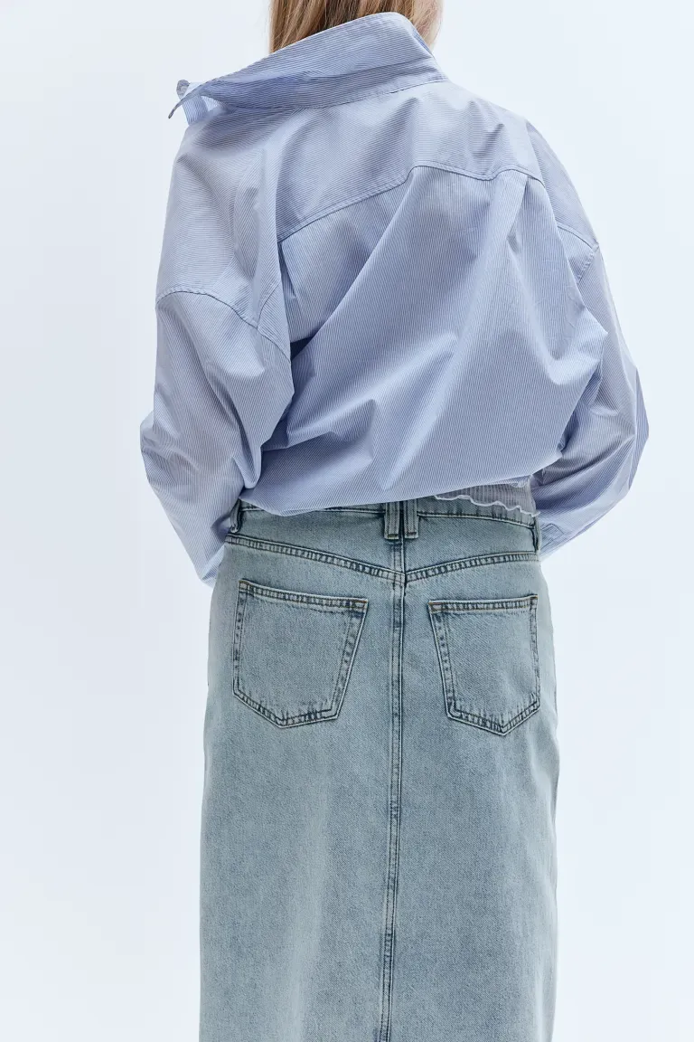 Jupe en jean à bords effilochés