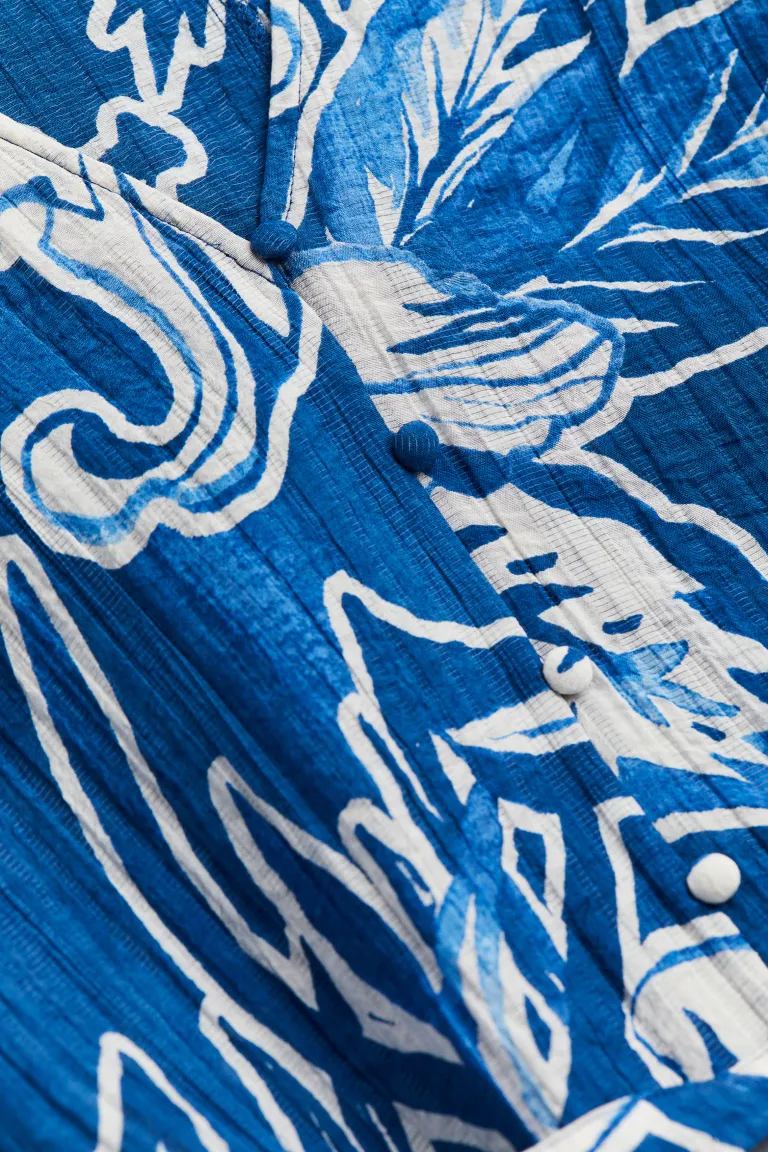 Robe en crêpe à ceinture nouée