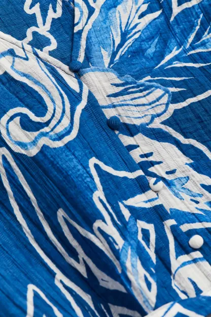 Robe en crêpe à ceinture nouée