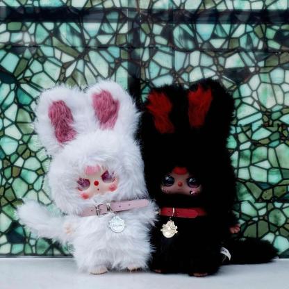 Three-year-old black and white twin plush