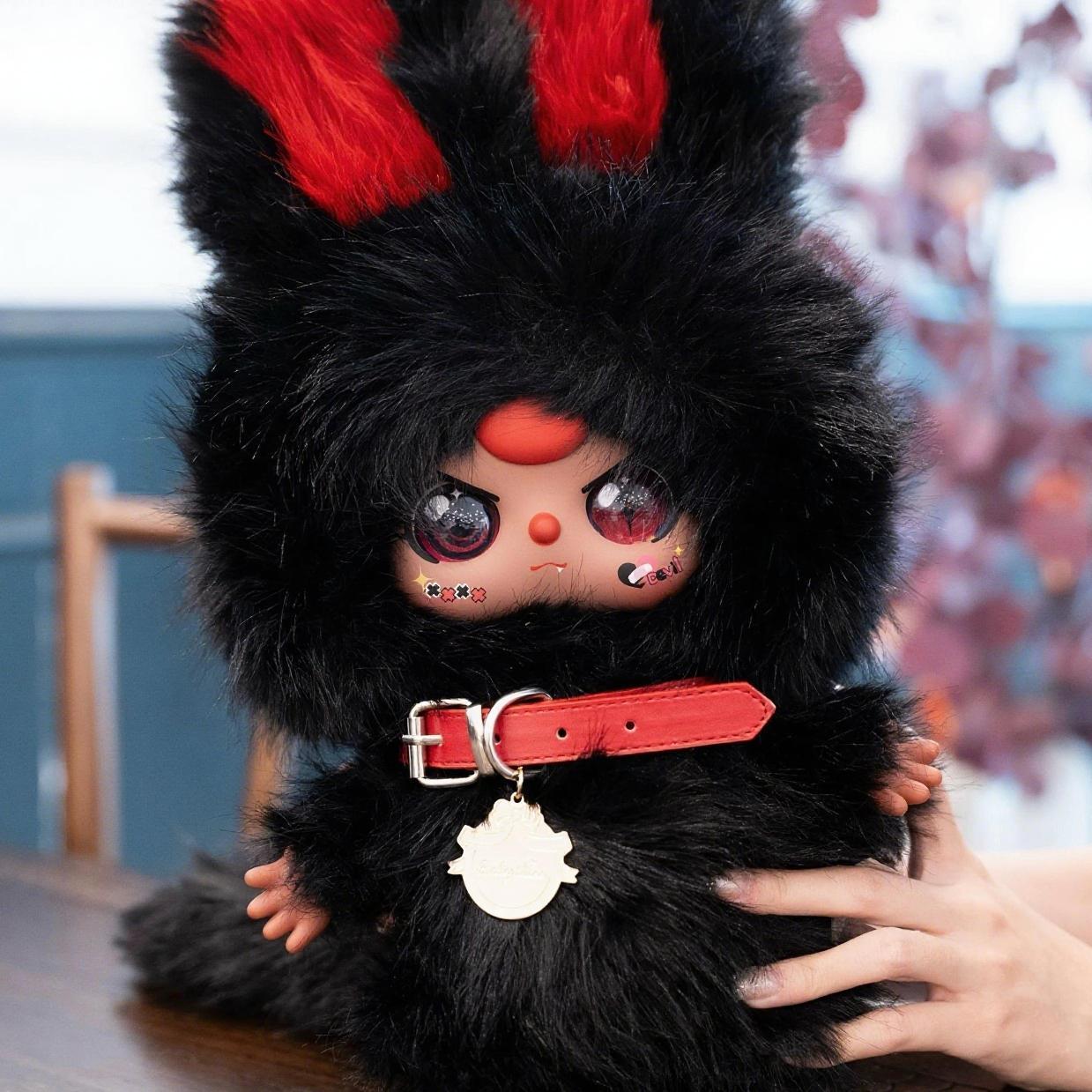 Three-year-old black and white twin plush