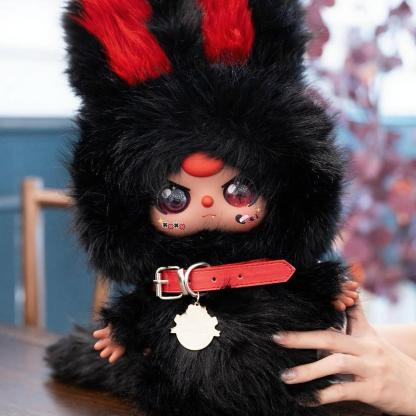 Three-year-old black and white twin plush