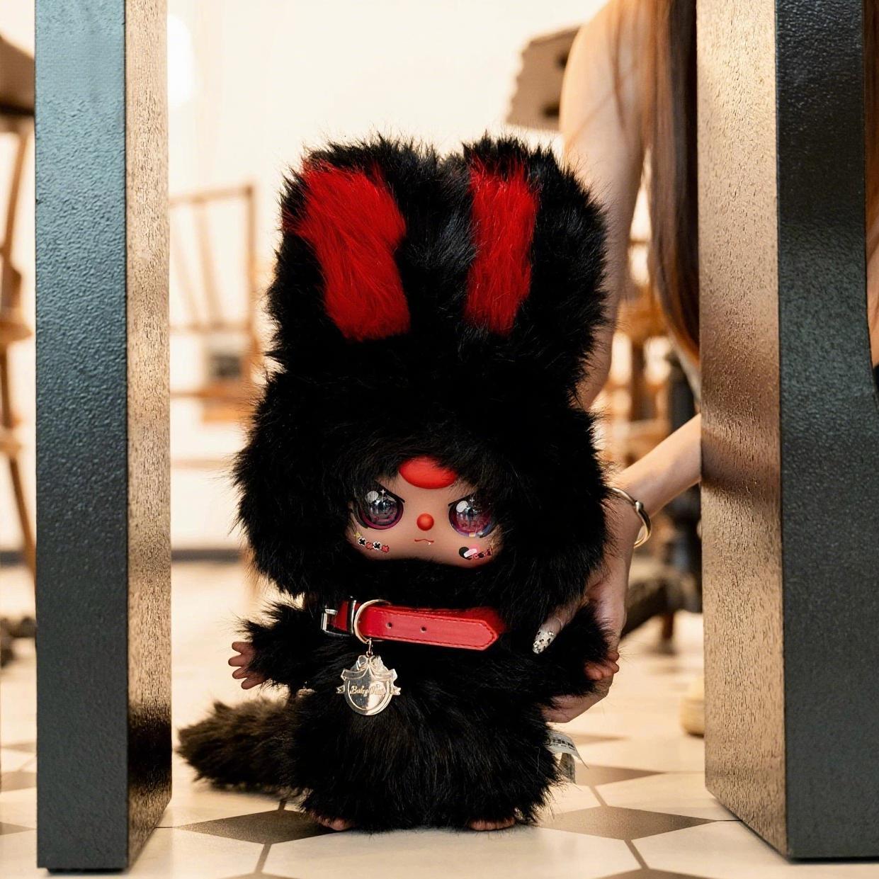 Three-year-old black and white twin plush