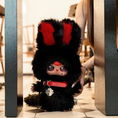 Three-year-old black and white twin plush