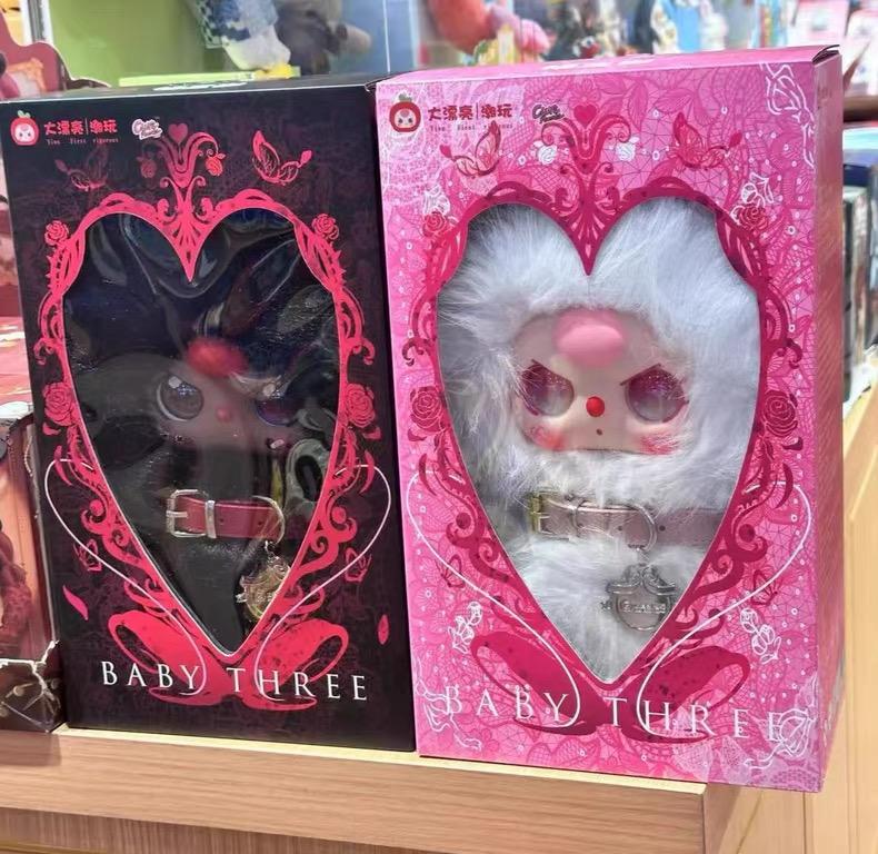 Three-year-old black and white twin plush