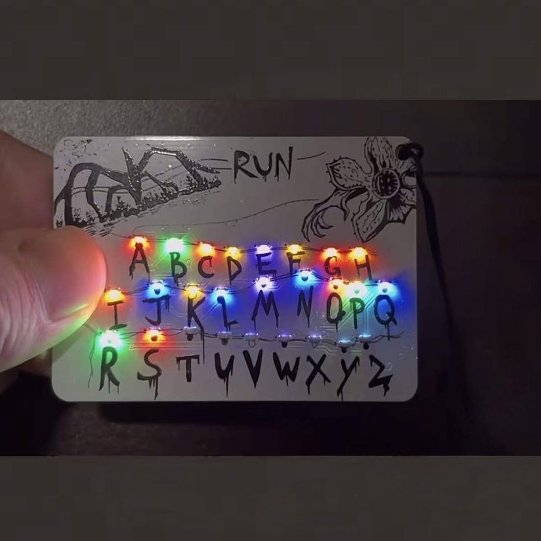 Stranger Things luminous flashing light keychain