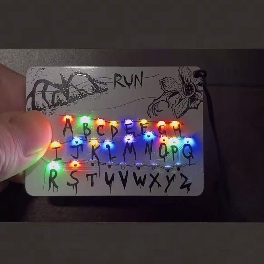 Stranger Things luminous flashing light keychain