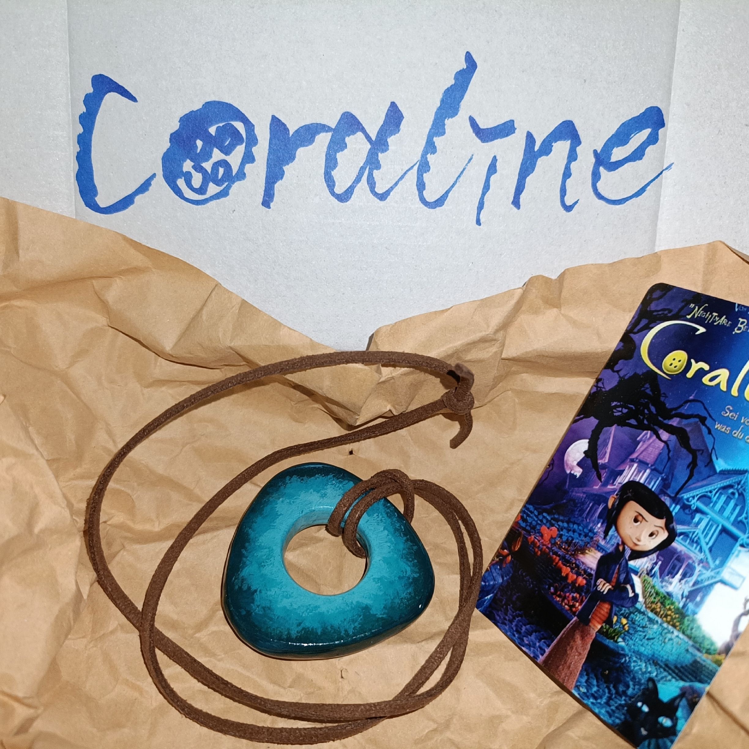Coraline Glow-in-the-Dark Caramel Candy Pendant
