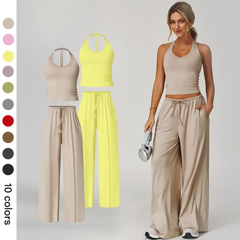 Women's Casual Sportswear Set — A slim-fitting, summer-style athletic outfit crafted from silky-feel polyester. It features an adjustable V-neck camisole paired with wide-leg trousers. Cool, quick-drying, and breathable, this set accentuates your alluring