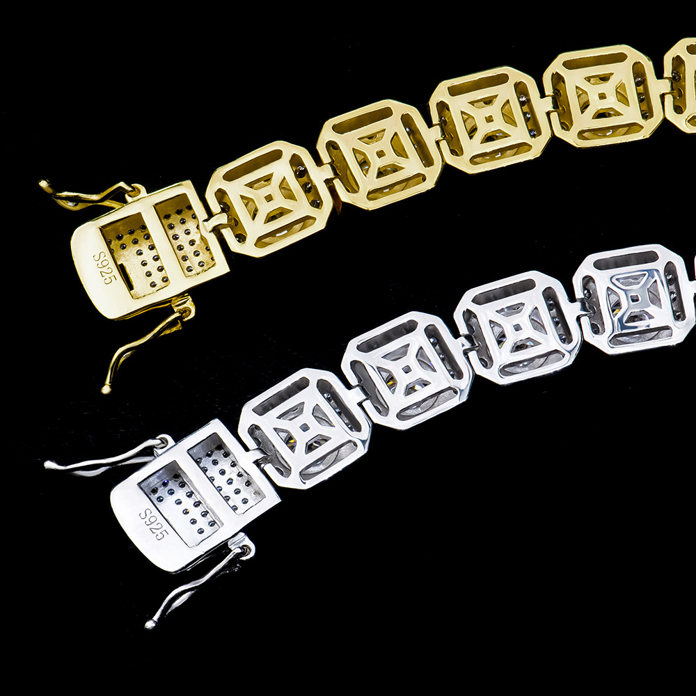 Artistic shot of the two iced out bracelets intertwined, showcasing potential stacking