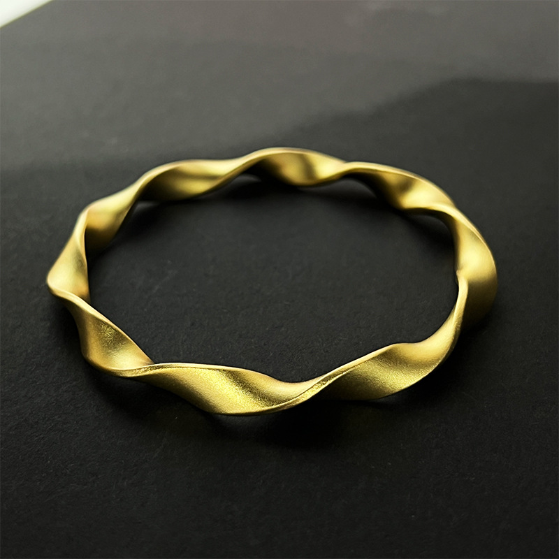 Solid .999 Sterling Silver with 24K Gold Vermeil Möbius Strip Bracelet