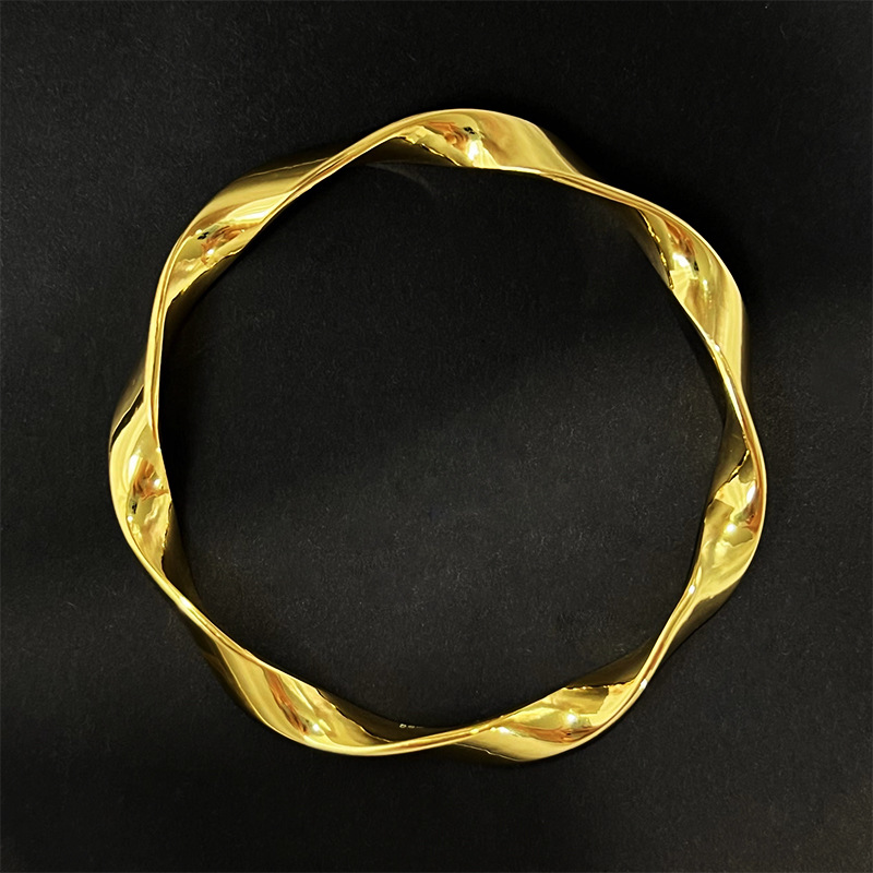 Solid .999 Sterling Silver with 24K Gold Vermeil Möbius Strip Bracelet