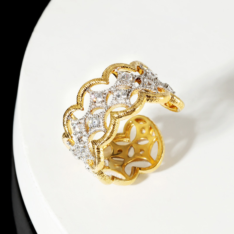 Side profile of geometric cluster ring showing 3D design and silver craftsmanship