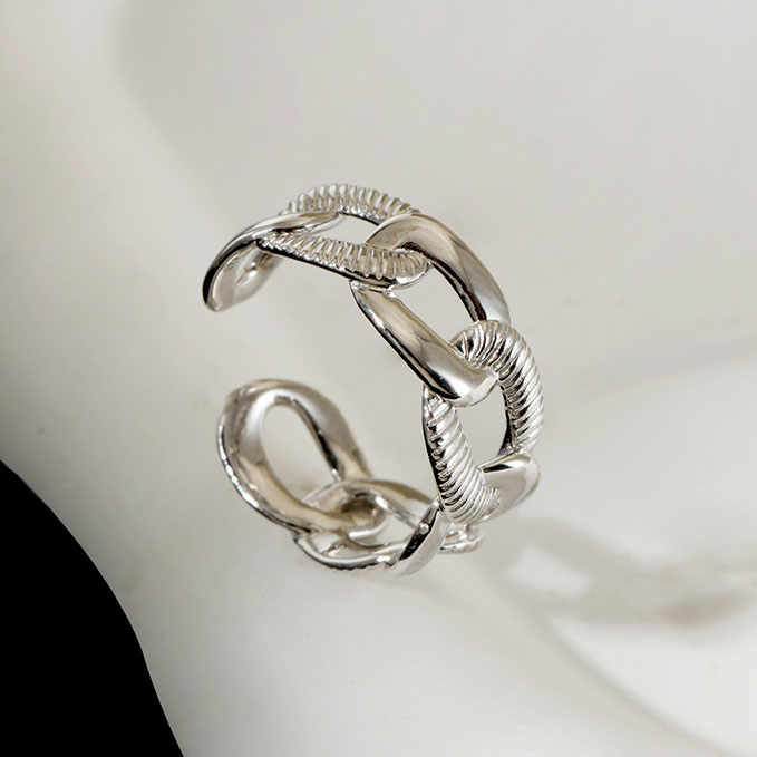 Front view of Adjustable French Chain Ring in Solid Sterling Silver on marble surface

