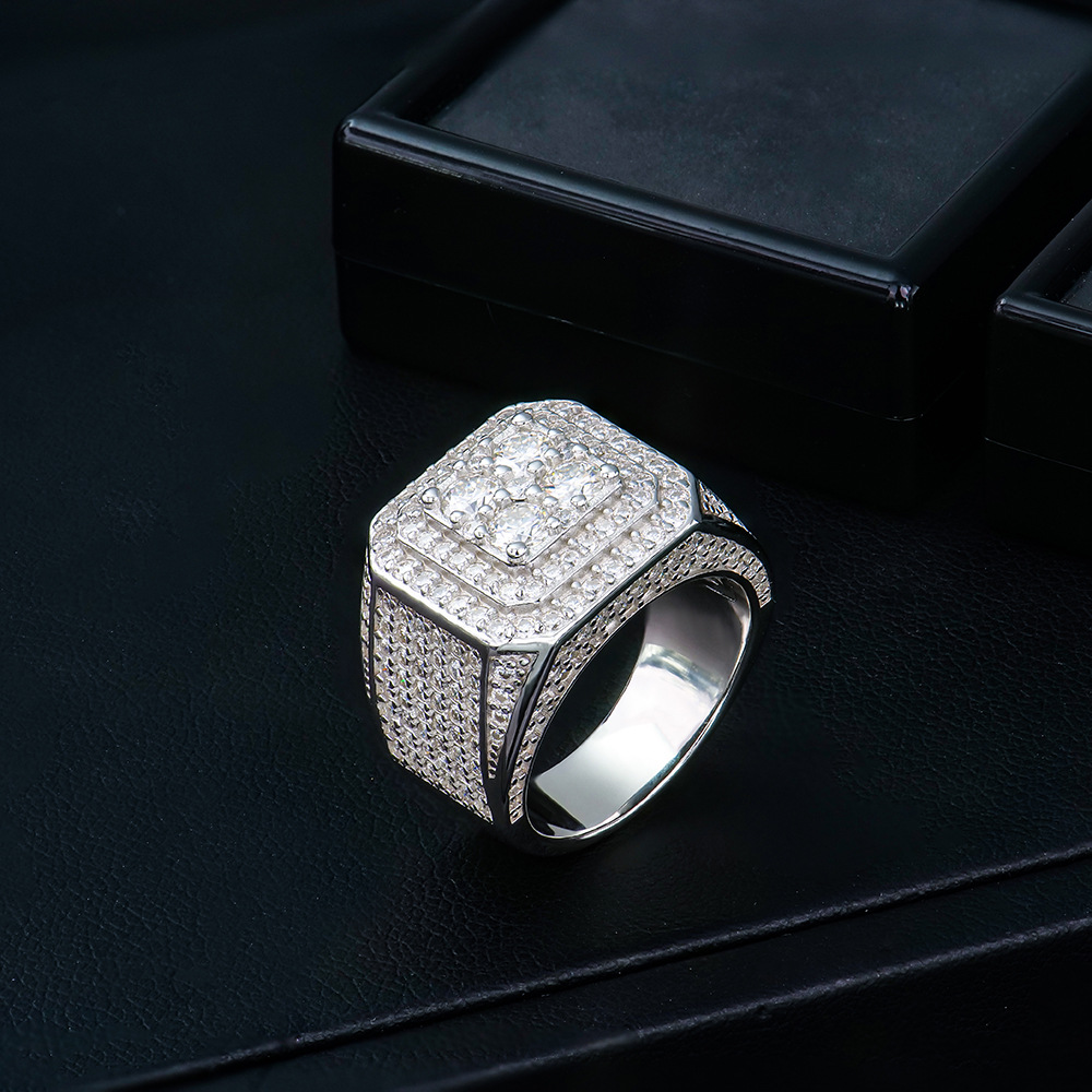 Model wearing moissanite pavé ring, hand portrait with urban lifestyle setting