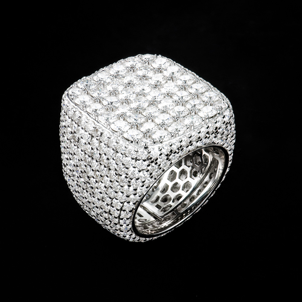 Top down macro shot of fully paved lab-created moissanite stones with brilliant sparkle