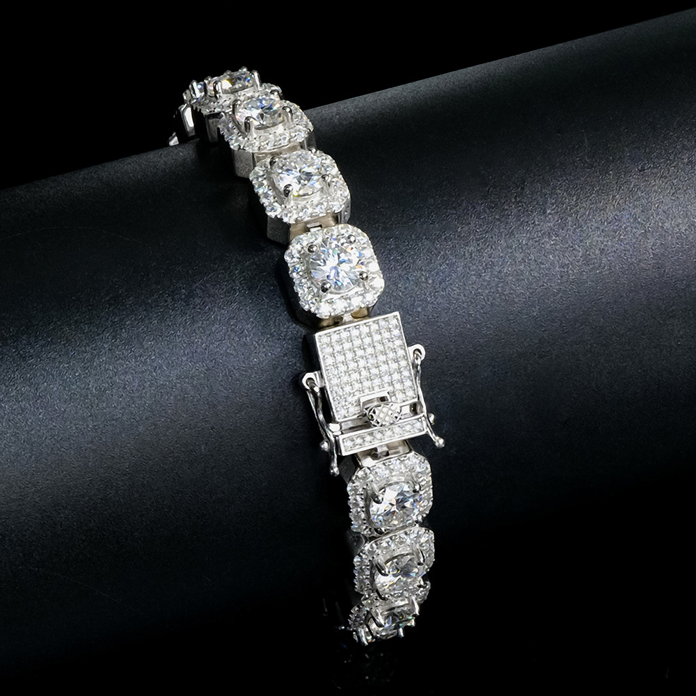 How the wide sterling silver moissanite bracelet looks when worn on a male wrist